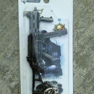 Modern warfare charm 40 cal SMG keychain